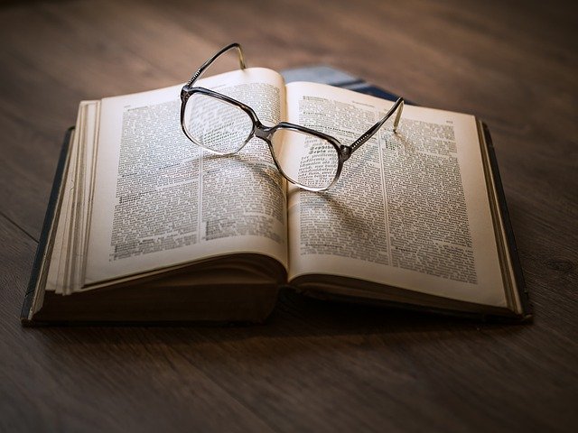 Glasses lying on a book