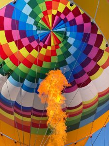 Picture of a hot air balloon with many colors